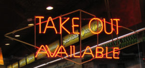 Take-Out Neon Sign in a New York deli