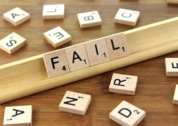 scrabble tiles spelling "fail"